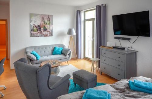 Magdeburg Apartment | SweetHome: Cozy Stay with Balcony, Kitchen & WiFi Access