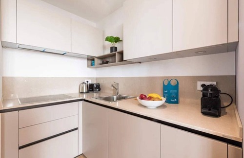 San Babila Apartment | Central Tower I Studio Apartment with Spa and Kitchen