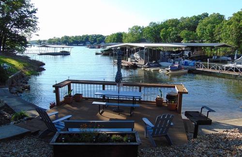 Lake Ozark Condo | Family Fun Awaits at Swim Dock: Lake View & Spa Access