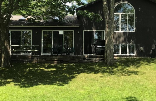 Liberty House | Unwind by the Lake: Swim, Fish, and Relax in Comfort!