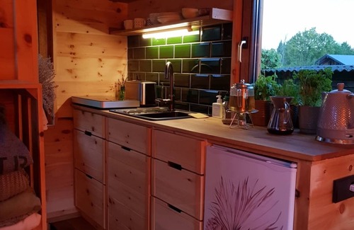 Muecke Cabin | Escape to Swiss Stone Pine TinyHouse by the Lake