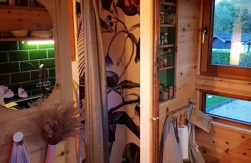 Muecke Cabin | Escape to Swiss Stone Pine TinyHouse by the Lake