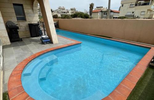 Nahariya Apartment | Relax at Sycamore on the Beach with Oceanfront Views