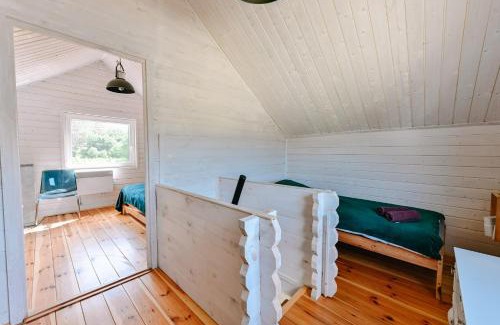 gmina Piotrkow Kujawski House | Relax at Szary Domek: Jacuzzi, Lake Views & Pet Friendly