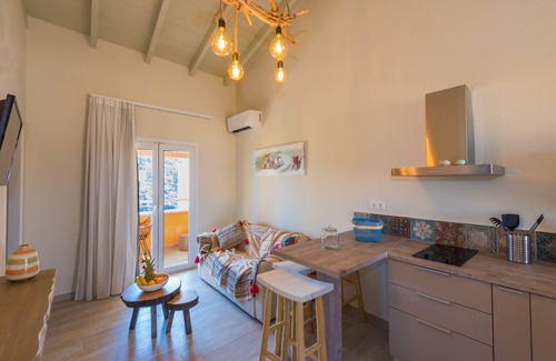 Gimari Villa | Experience T'adelfia: Poolside Oasis with Ocean Views