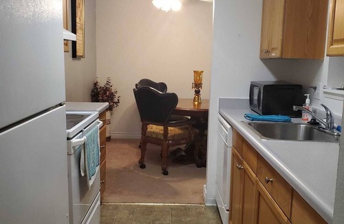 University Place Condo | Discover T Regency Suite with Pool and Kitchen Amenities