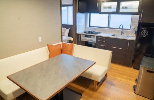 Kitaazumi-gun Hotel | Discover T Square Hakuba: Family-Friendly with Hot Tub