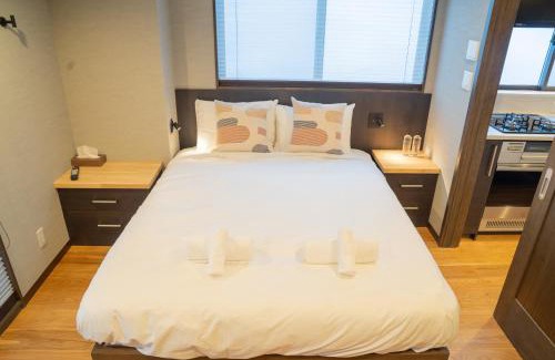 Kitaazumi-gun Hotel | Discover T Square Hakuba: Family-Friendly with Hot Tub