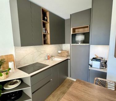 Madeleine-Champ de Mars Apartment | Convenient Stay Near Cité des Congrès with Parking