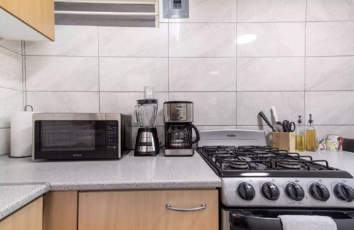 Roma Norte Apartment | Cozy One Bedroom Apartment with Kitchen & Child-Friendly Amenities