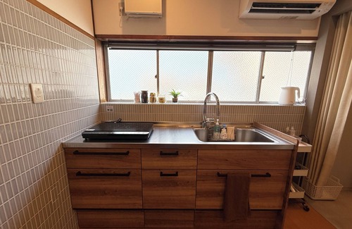 Sumiyoshi Apartment | Discover TABISAI House: Family-Friendly Stay with Breakfast