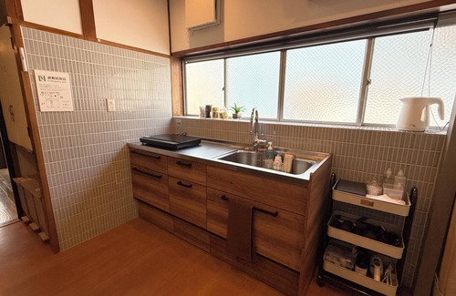 Sumiyoshi Apartment | Discover TABISAI House: Family-Friendly Stay with Breakfast