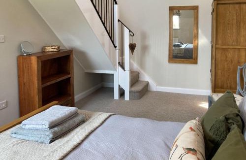 Tilston House | Family-Friendly Escape at Tadpole Mews with Hot Tub