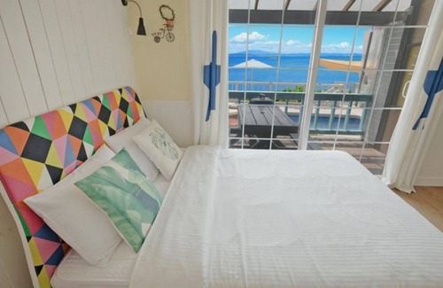 Taean House | Experience Comfort at Taean Elvis Pension with Pool & Breakfast