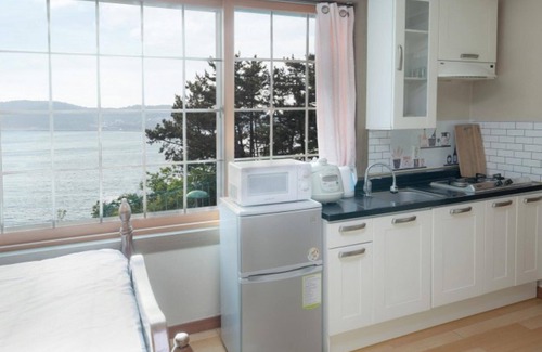 Nam House | Discover Taean Red Pension: Family-Friendly Retreat with Pool