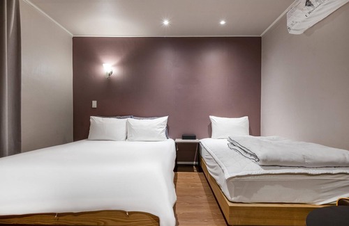 Taebaek Hotel | Inviting Taebaek Art Deco: Eco-Friendly Family Retreat