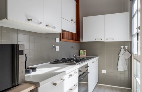 Savena Condo | Inviting Tagliacozzi Suites Apartment with Family Amenities