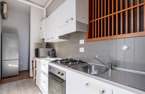 Savena Condo | Inviting Tagliacozzi Suites Apartment with Family Amenities