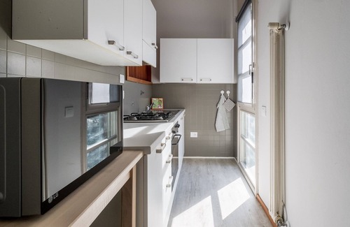 Savena Condo | Inviting Tagliacozzi Suites Apartment with Family Amenities