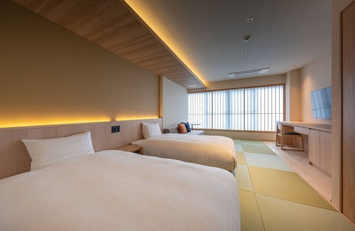 Asakura House | Relax at Taisenkaku: Family-Friendly Hotel with Pool & Dining