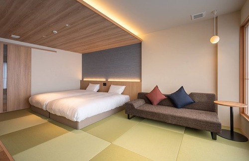 Asakura House | Relax at Taisenkaku: Family-Friendly Hotel with Pool & Dining