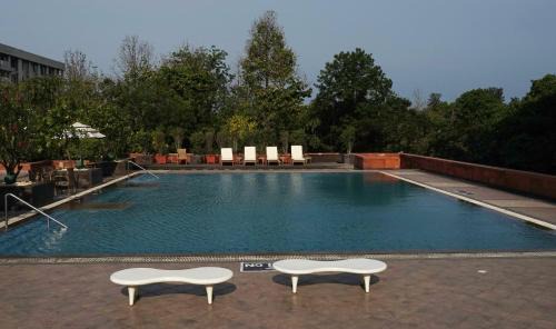Kishangarh Hotel | Relax at Taj Chandigarh: 5-Star Oasis with Ocean View