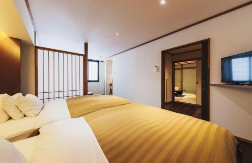 Zaoonsen Hotel | Relax at Takamiya Ryokan Miyamaso with Hot Tub Amenities