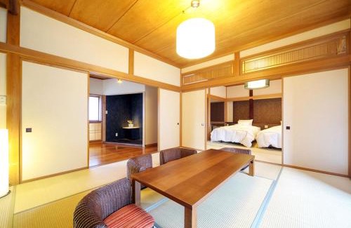 Takanosu Onsen Hotel | Relax at Takanosukan: 4-Star Stay with Hot Tub & Family-Friendly