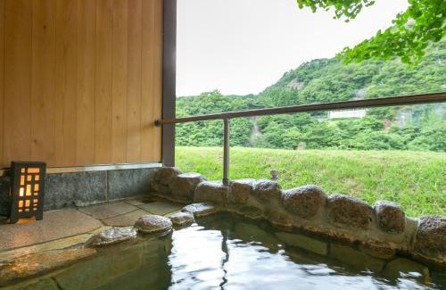 Takanosu Onsen Hotel | Relax at Takanosukan: 4-Star Stay with Hot Tub & Family-Friendly