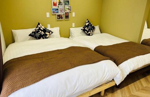 Ikuno Villa | Comfortable Stay Near Tsutenkaku with Hot Tub & WiFi