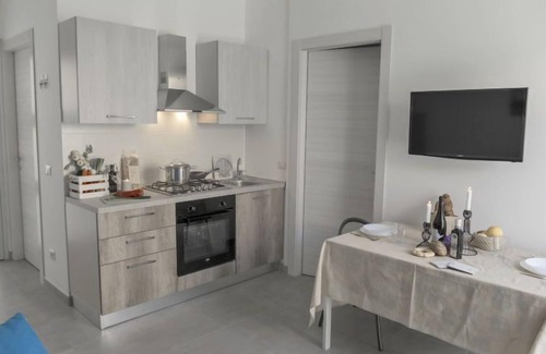 Sampieri Apartment | Discover Talìa Luna: Oceanfront Stay with Spa & Pool