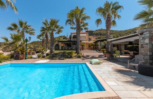 Sarti Apartment | Discover Talizeti Home: Oceanfront Retreat with Pool