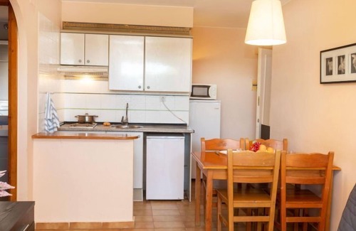 Els Griells Apartment | Relax at Tamarius by Interhome with Oceanfront Amenities