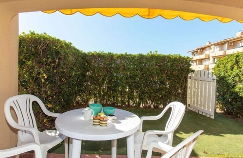 Els Griells Apartment | Relax at Tamarius by Interhome with Oceanfront Amenities
