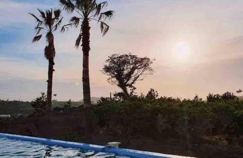 Aewol Villa | Idyllic Tamnaneun Farm: Oceanfront Retreat with Pool