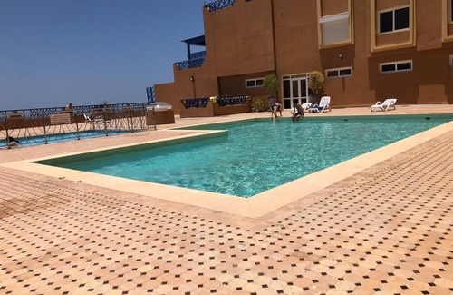 Tamrhakht Apartment | Relaxing Tamraght Apartment with Pool and Ocean Views