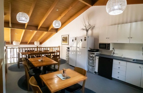 Baw Baw Village Cabin | Discover Tanjil Creek Lodge: Modern Bedroom with Kitchenette