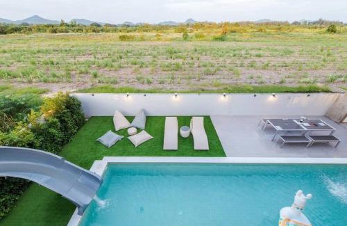 Hin Lek Fai Villa | Experience Tantawan Poolvilla Huahin: Pet-Friendly Oasis