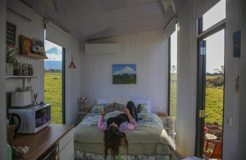 Midhirst House | Explore Taranaki Creekside KEA: Family-Friendly Retreat