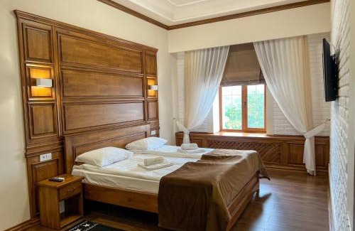 Kamenets-Podol'skiy Hotel | Pet-Friendly Retreat at Taras Bulba with Hot Tub & Dining