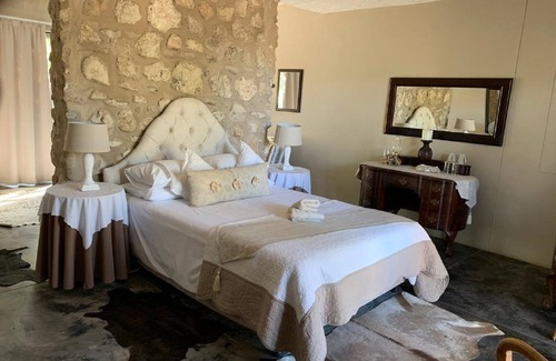 Okaukuejo Cabin | Experience Family-Friendly Comfort at Tarentaal Guest Farm