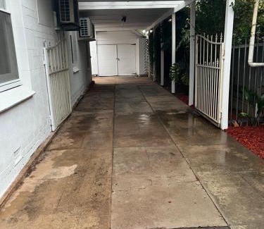 Greenacres Apartment | Cozy Tasha's Duplex on Muller with Hot Tub & Family Fun