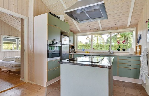 Grena Strand House | Oceanfront Haven: Tashina by Interhome, Steps from the Sea