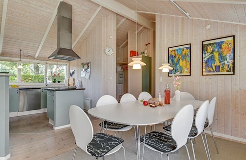Grena Strand House | Oceanfront Haven: Tashina by Interhome, Steps from the Sea