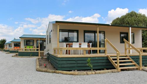 Waitakaruru Resort | Discover Tasman Holiday Parks - Miranda with Oceanfront Views