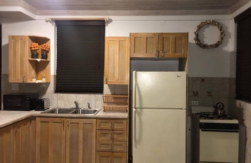 Nassau Apartment | Stylishly Furnished One Bedroom with Breakfast & Kitchen