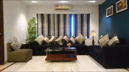 Kolkata Hotel | Discover Tatvam Residency: Family-Friendly with Pool & Breakfast