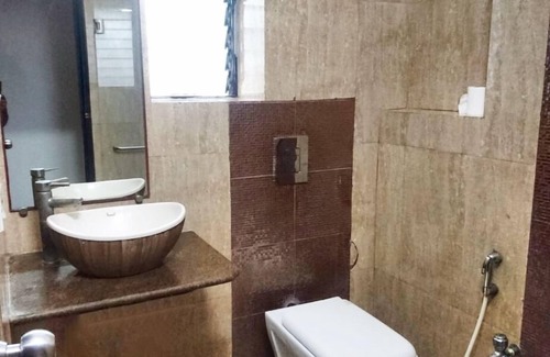Kolkata Hotel | Discover Tatvam Residency: Family-Friendly with Pool Access