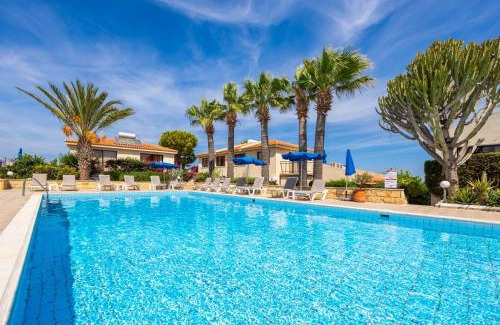 Latchi Apartment | Unwind at Tavros Hotel Apartments with Pool & Family Amenities