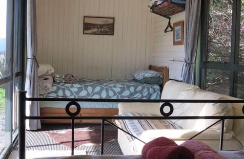 Palliser Bay House | Discover Te Rakau Cabins: A Wildlife Retreat with Pool & Pets